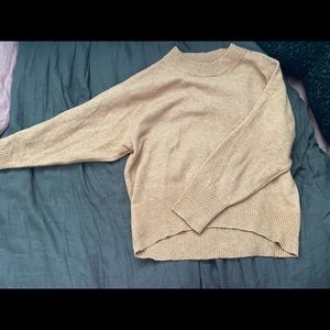 light brown target sweater